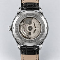 Verso do Specht & Söhne Invictus 1986 Ice Blue, com movimento visível e pulseira preta com forro bege.